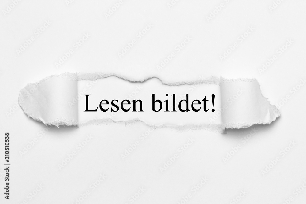 Lesen bildet! auf weißen gerissenen Papier Lesen bildet! auf weißen gerissenen Papier