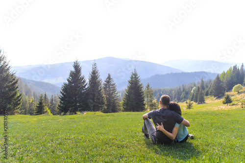 Hugging Man and Woman Enjoying Landscape