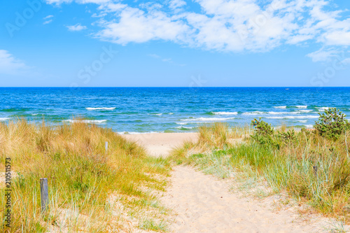 Path to beach in Baabe summer resort among sand dunes, Ruegen island, Baltic Sea, Germany