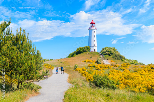 Path to Dornbush lighthouse in spring landscape with flowers on northern coast of Hiddensee island, Baltic Sea, Germany