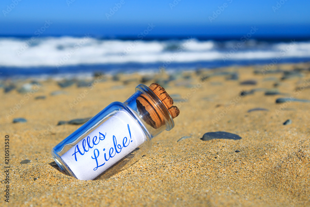 Flaschenpost am Strand Alles Liebe! StockFoto Adobe Stock