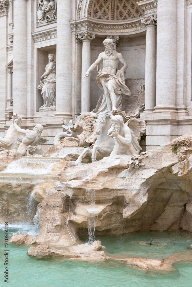 Side view of the statues of the Trevi Fountain in Rome. Vertically.