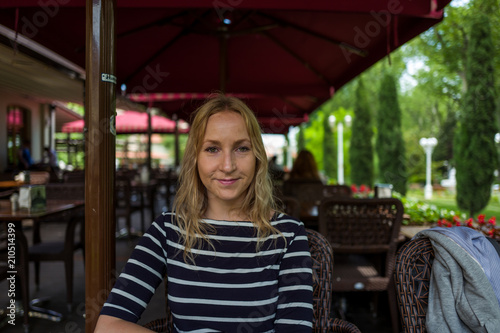 Blone girl in cafe in Istanbul, Turkey. photo