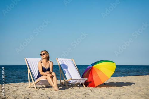 Woman relaxing on beach © Jacek Chabraszewski