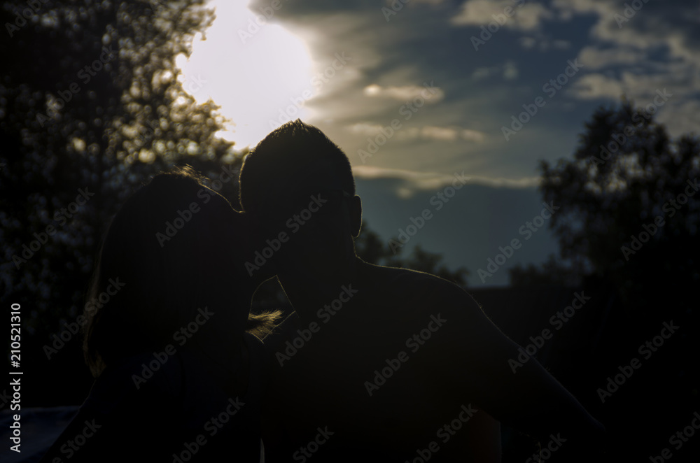 silhouette of a guy and a girl