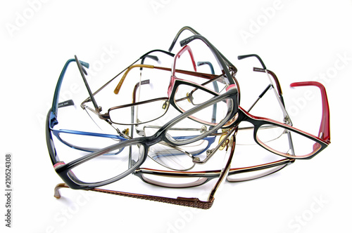 stack of old reading glasses 
