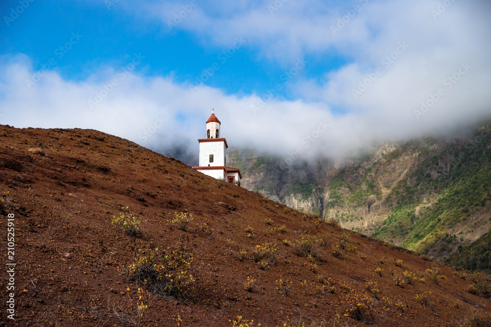 The church La Candelaria on a red sloping hill, Frontera, El Golfo, El Hierro, Canary Islands, Spain
