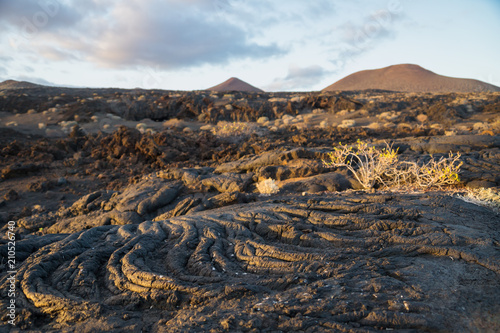 Last sun on Lava fields with rocks and lava streams, La Restinga, El Hierro, Canary Islands, Spain photo