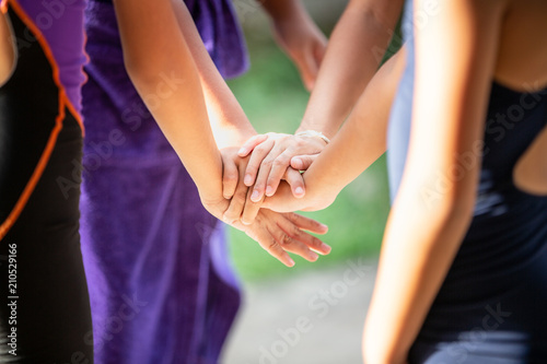 Athlete swimmer stacking hand unity together  teamwork concept