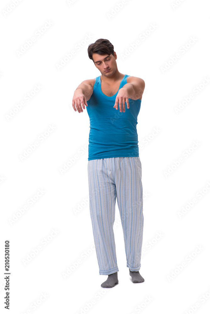 Man waking up with alarm clock isolated on white