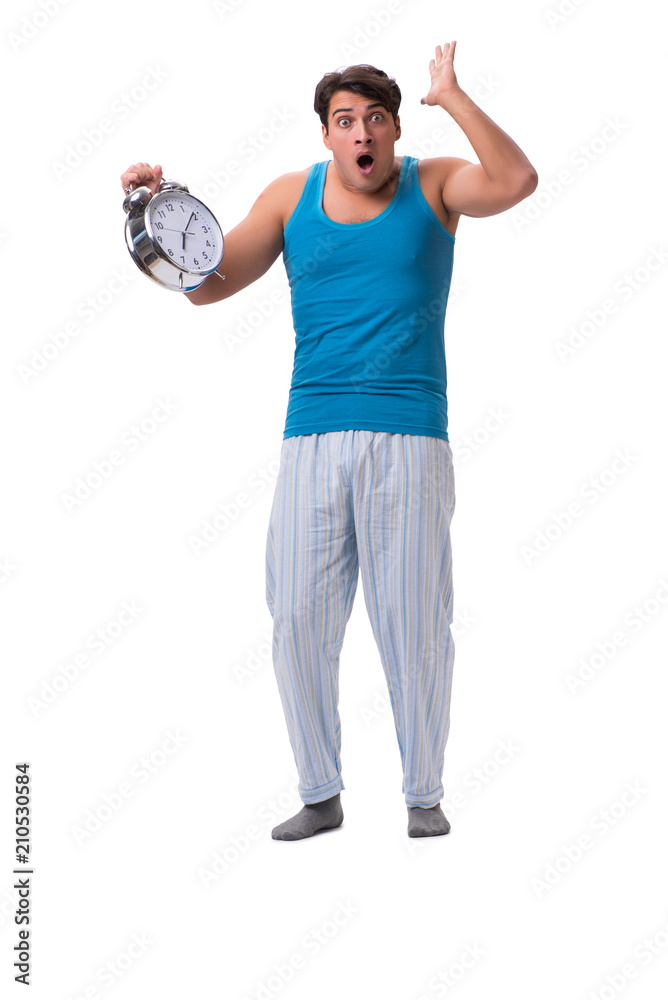 Man waking up with alarm clock isolated on white