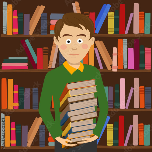 Student boy holds stack of books standing against bookshelf in library