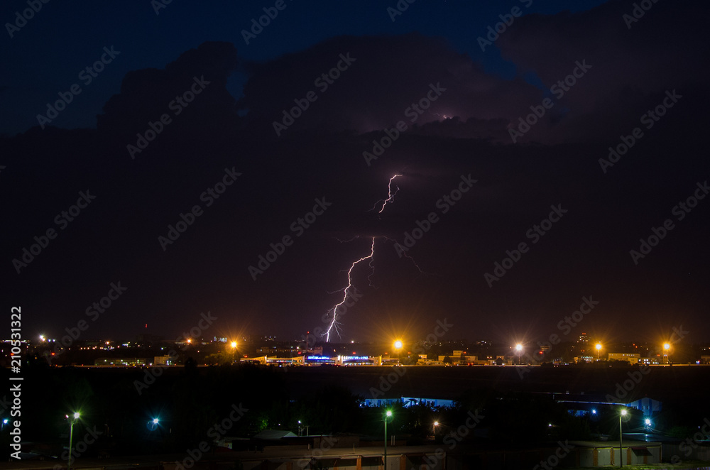 bright lightning at night in the city