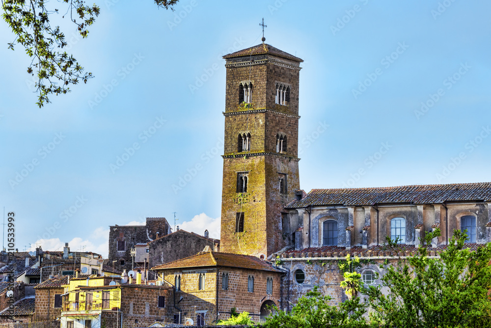 Cityscape of the ancient village of Sutri and the bell tower of  Holy Mary Assumption s Co-Cathedral  - Sutri , Italy