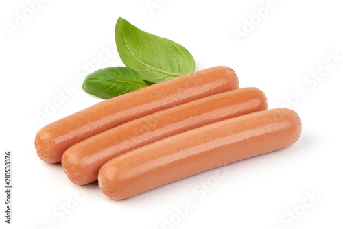 Fresh boiled sausages with basil, isolated on white background. photo