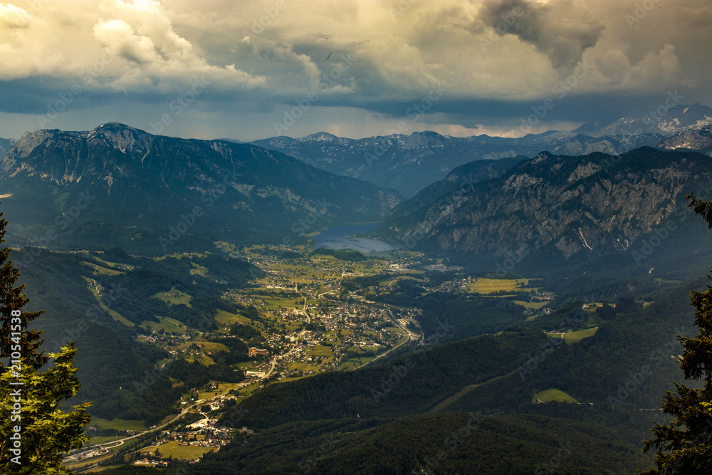 alpine scenic view over a valley and lake alpine scenic view over a valley and lake