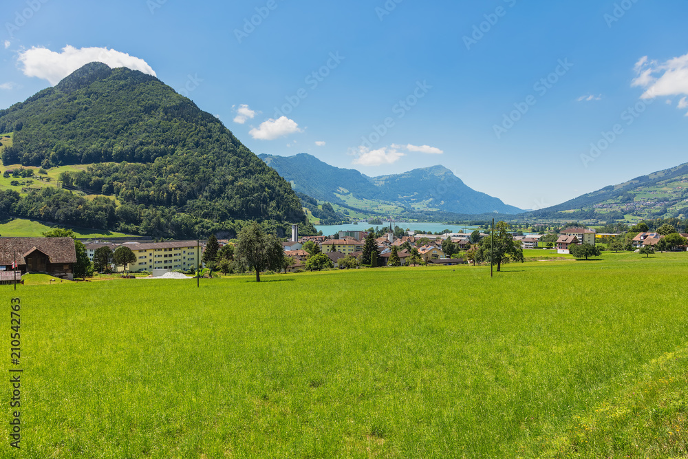A summertime view in the village of Seewen in the Swiss canton of Schwyz, Mt. Rigi in the background