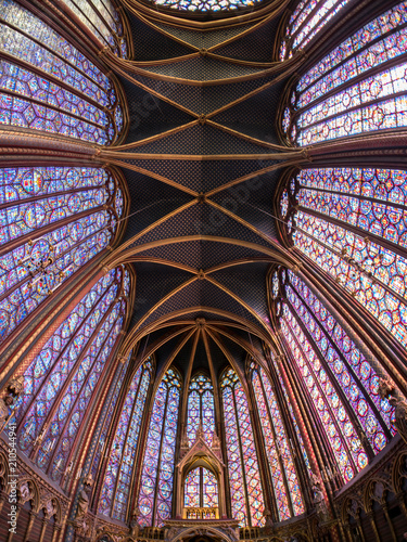 Rich and beautiful decorated interior of the Gothic Medieval Sainte Chapelle - a royal chapel in Paris, France. June, 2018