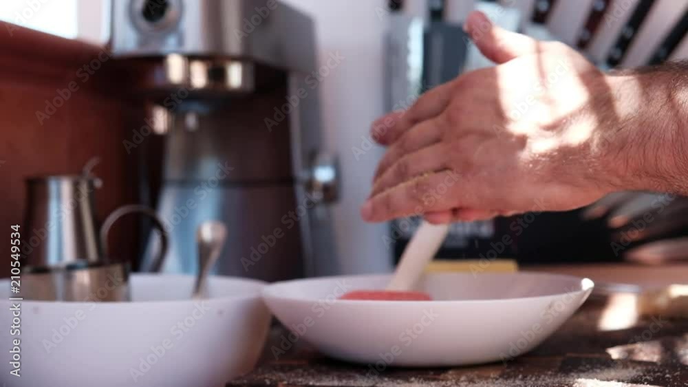 Chef cooking cutlets of minced squid Chef cooking cutlets of minced squid