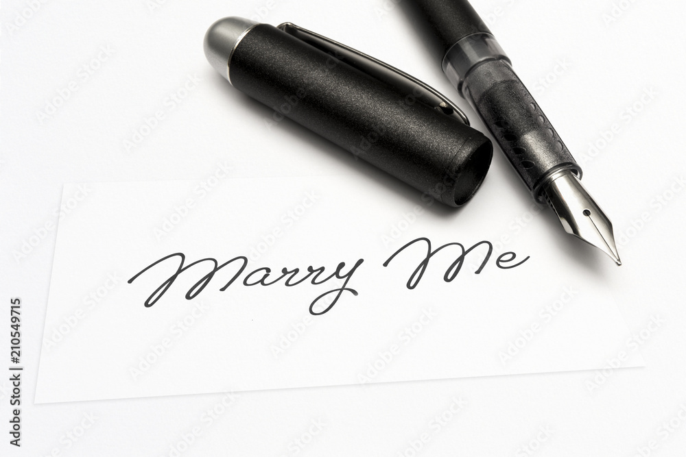 close-up of a greeting card with the sweet word, marry me close-up of a greeting card with the sweet word, marry me