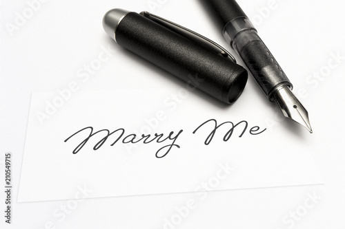 close-up of a greeting card with the sweet word, marry me