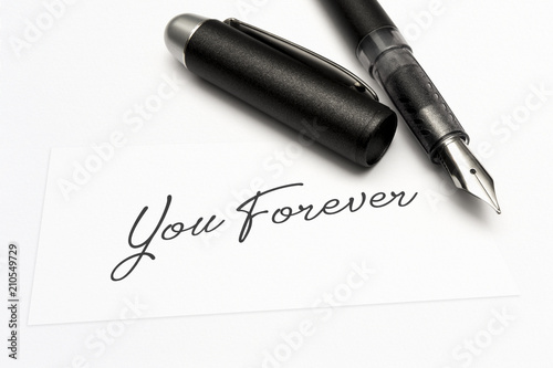 close-up of a greeting card with the sweet word, you forever