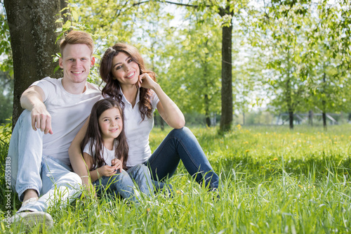 Portrait of happy family in park