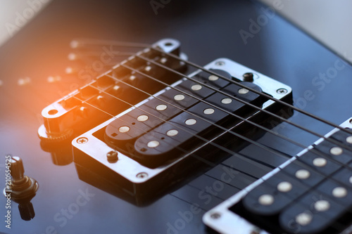 Black arrowed electric guitar close up