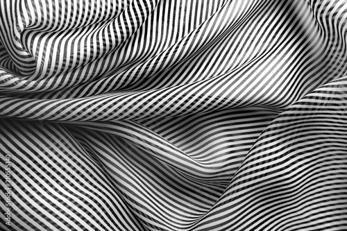 Elegant black and white silk with stripes, abstract background