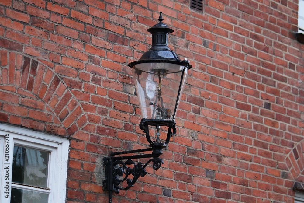 beautiful old lamp on the house wall