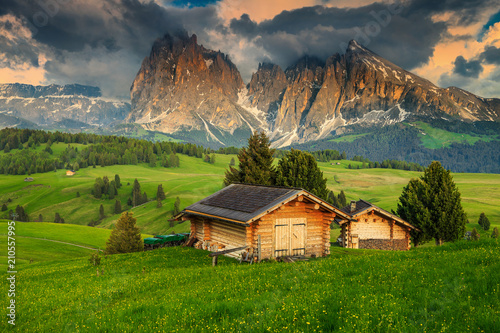 Seiser Alm resort and Langkofel group at sunset, Dolomites, Italy photo