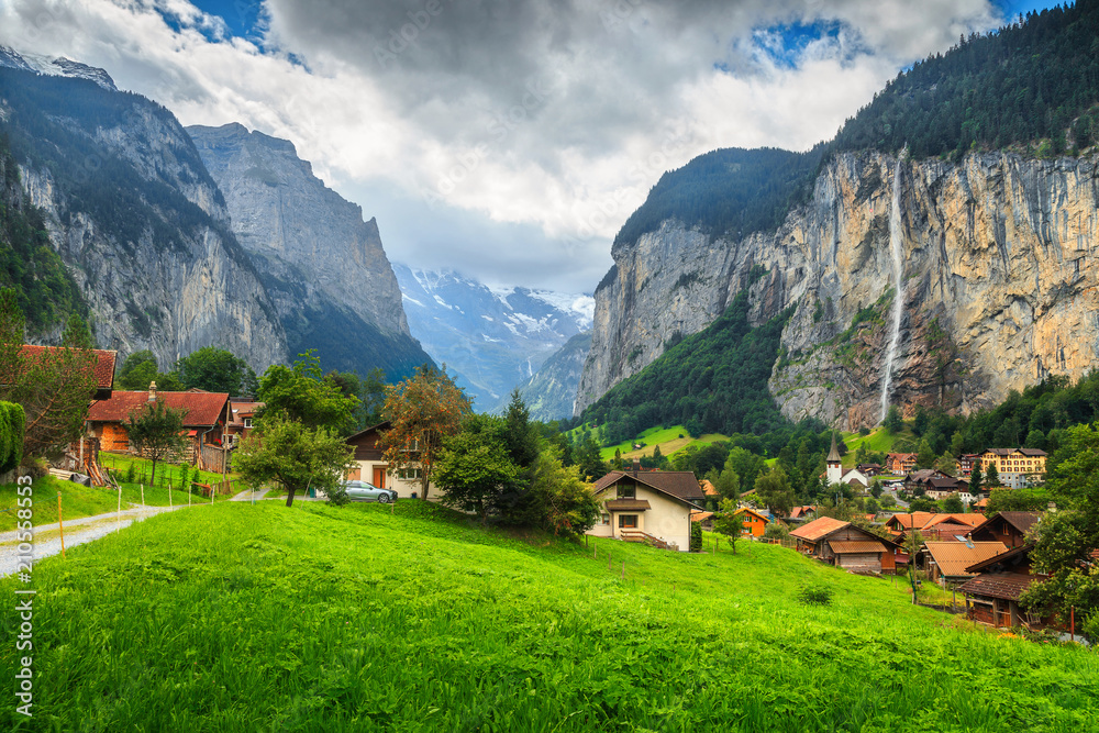 Spectacular Lauterbrunnen town and Staubbach waterfall, Bernese Oberland, Switzerland, Europe