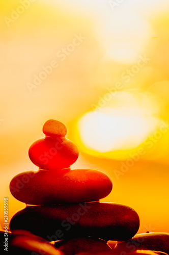 stack of zen stones on pebble beach