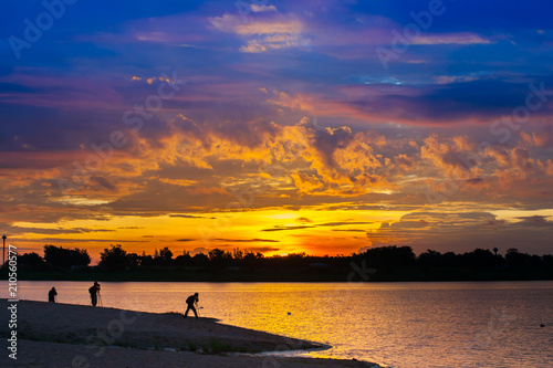 Colorful of sunset timing with sky reflect on water