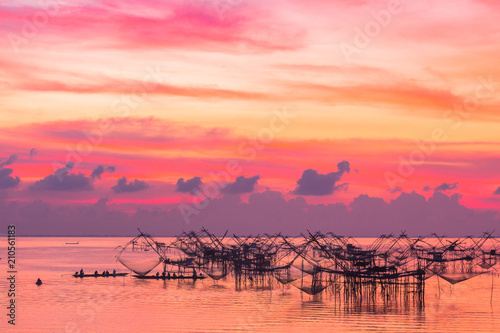 scenery sunshine above  fishing trap at Pak Pra lagoon in Talay Noi Phaphalung province Thailand. photo