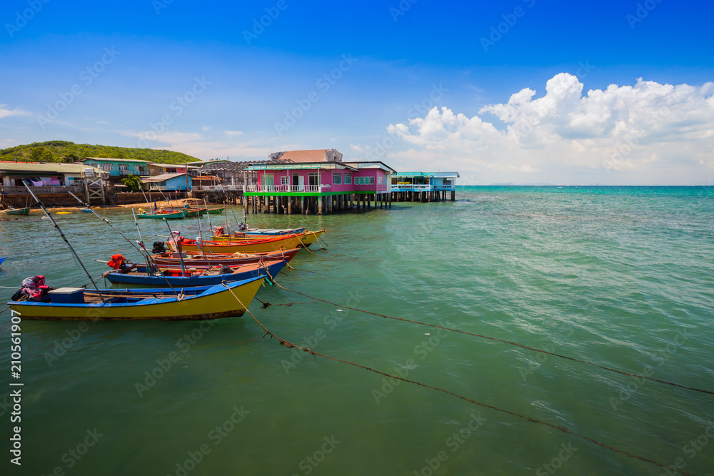 Landscape view of beach with boat located at Tropicana Thailand