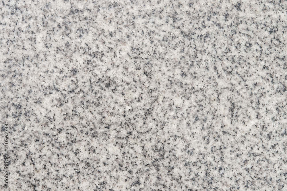 Working surface of gray granite texture. The view from the top. Working surface of gray granite texture. The view from the top.