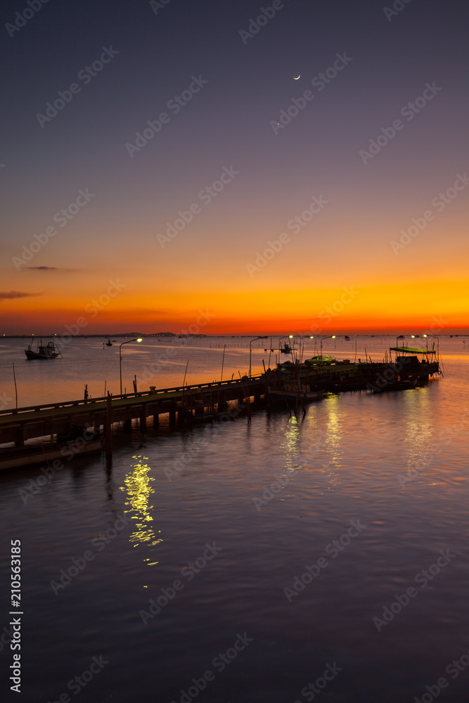 Beautiful sunset landscape view on sea and boat with colorful of sky located eastern of in Thailand