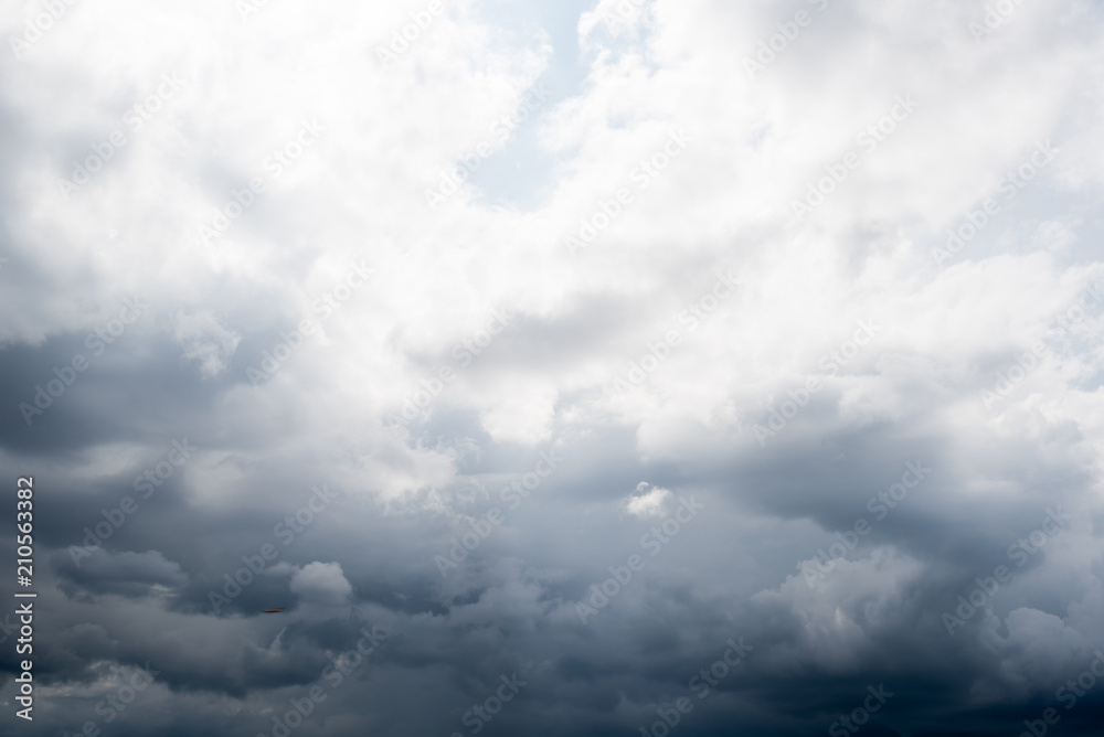 dark storm clouds with background,Dark clouds before a thunder-storm. dark storm clouds with background,Dark clouds before a thunder-storm.