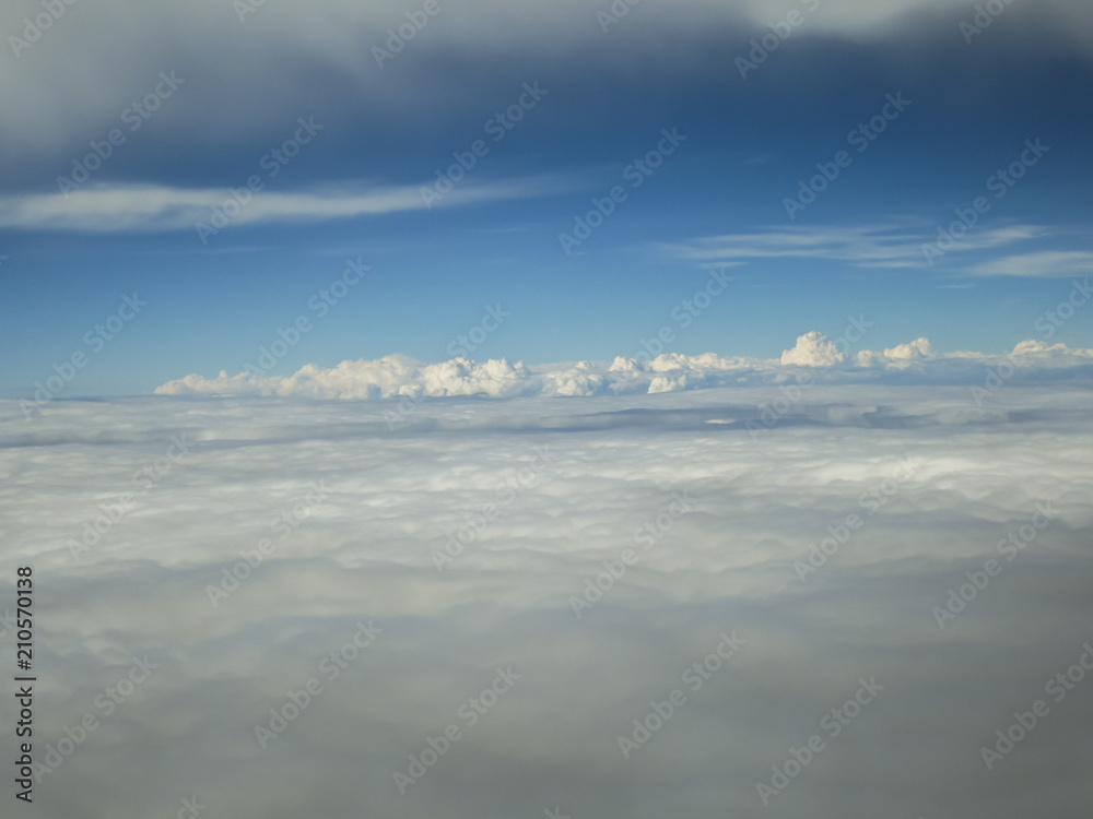 Bird eye view of cloudy on sky from airplane