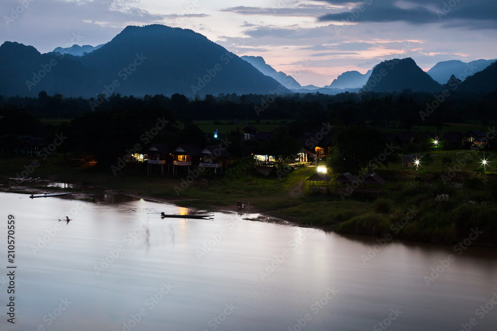 Landscape view of mountain and river at sunset timing with foggy  located at tropicana south east asia laos country