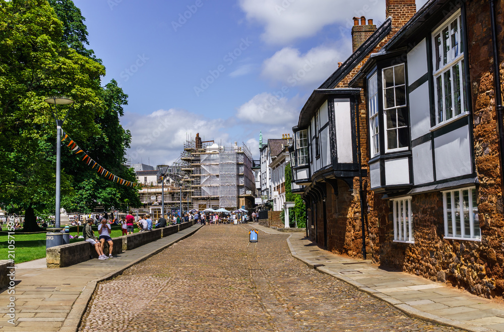 Exeter.U.K. June 02, 2018 Square near the old, beautiful and high cathedral