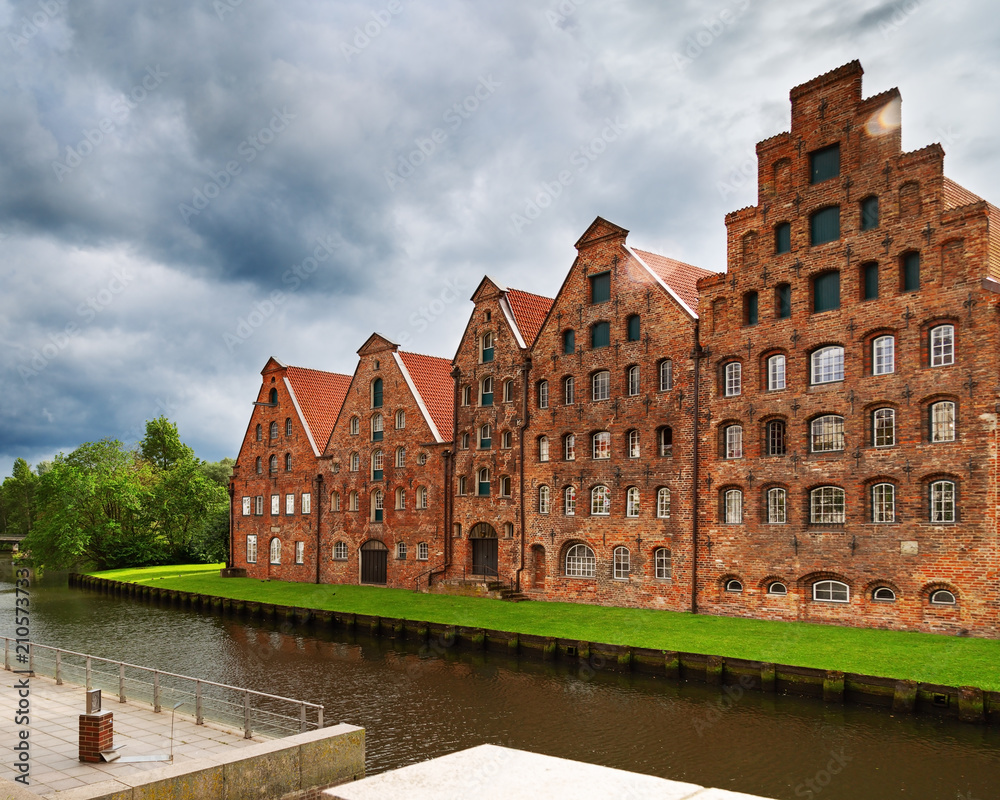 Urban landscape of city of Lubeck. Museum Holstentor in old historical building. Attraction of old town. Germany, June 2017.