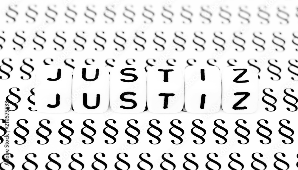 Obraz premium Justiz Symbol auf Paragraphenzeichen