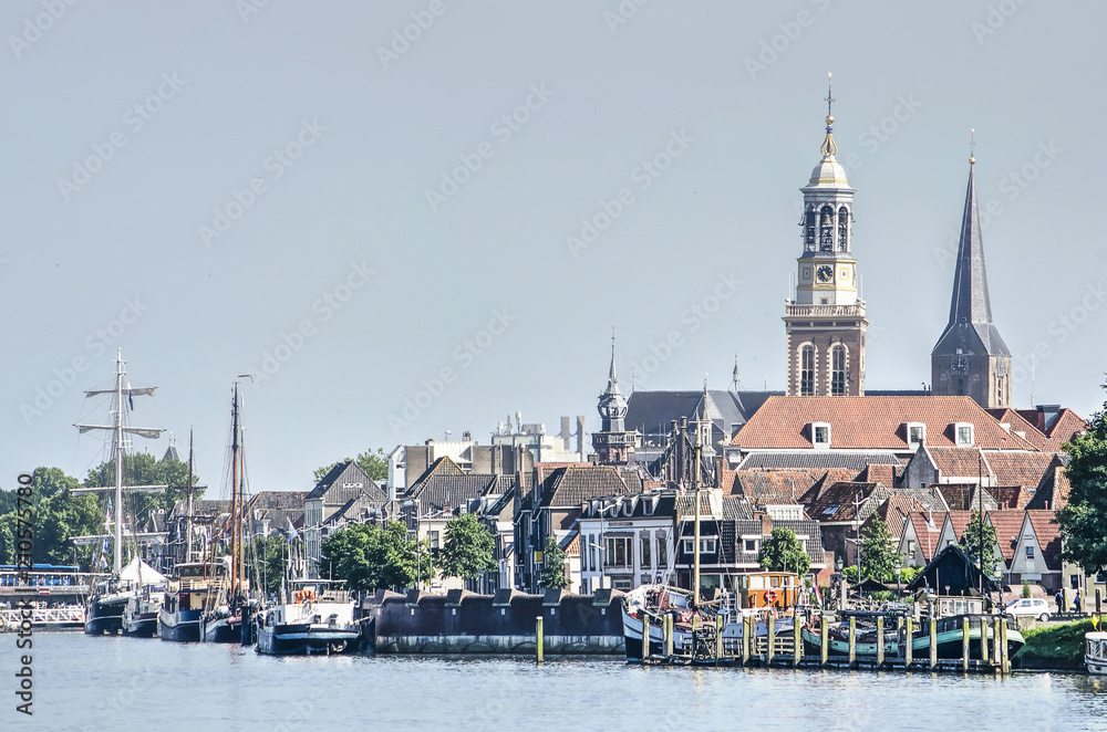 View across the river IJssel towards the riverfront of the old Hanze town of Kampen, The Netherlands