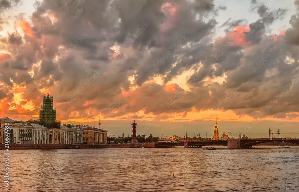 Peter and Paul fortress across the Neva river, St. Petersburg, Russia. Dramatic sunset