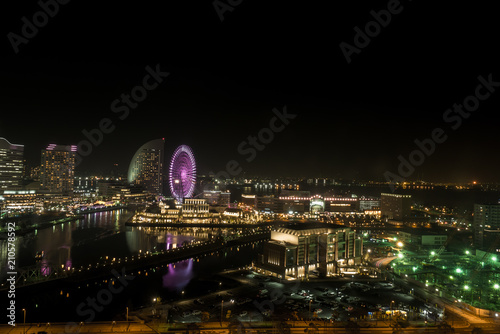 Water reflection of wonderful color at night time ,cityscape view at Yokohama japan