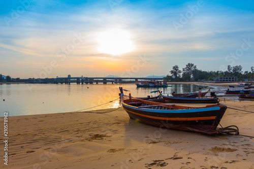scenery sunrise above Sarasin bridge. fishing boats parking on the Sarasin beach. Sarasin bridge linking the province of Phang Nga and Phuket.