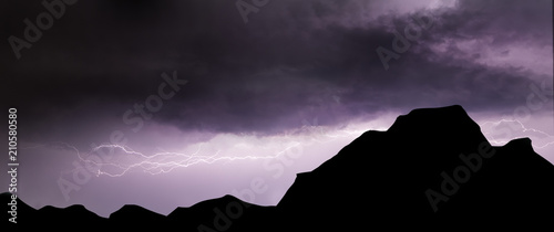 Powerful lightning storm raging in moody dramatic sky