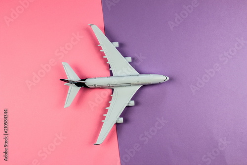 Plane, aircraft on color background. Travel concept. Empty space for text and design